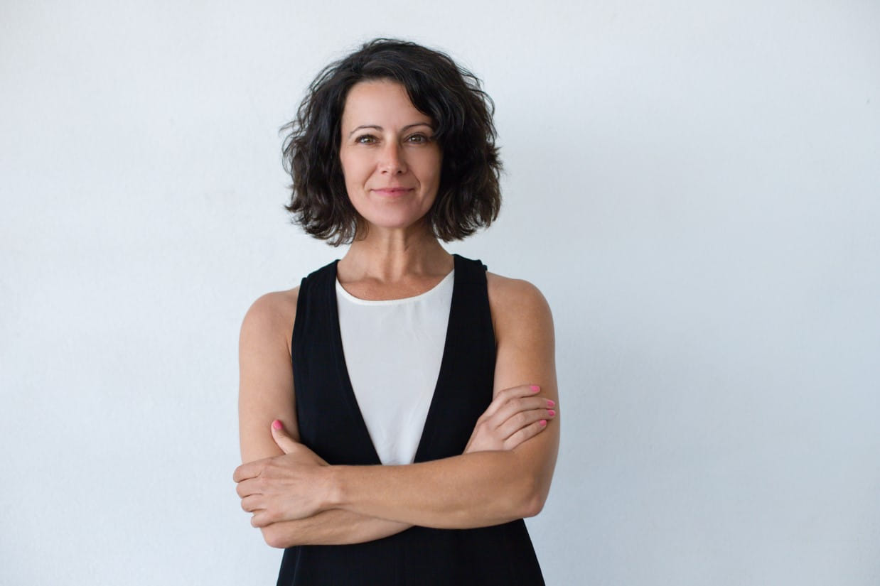 cheerful-middle-aged-woman-with-curly-hair.jpg